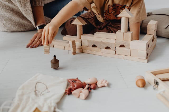 child playing with blocks